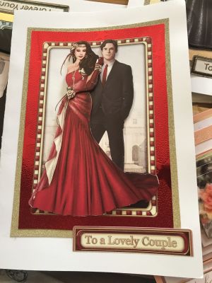 Handmade wedding card of an art deco couple